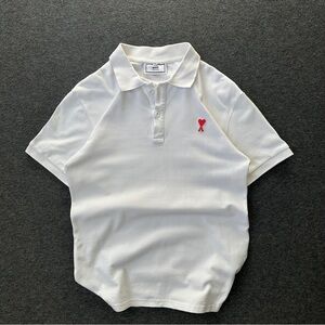 Ami White Polo with Red Heart Logo